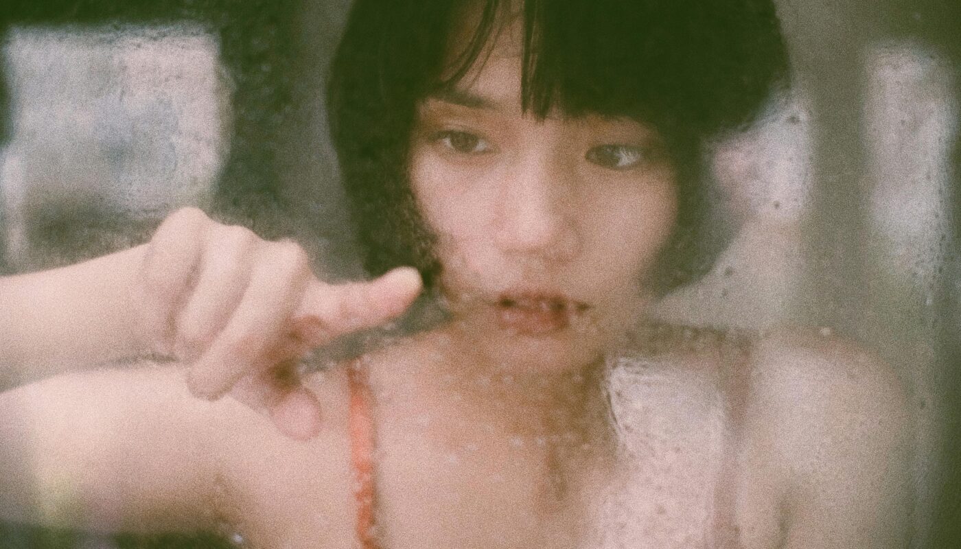https://www.pexels.com/photo/ethnic-female-touching-wet-window-6279442/