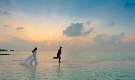 https://www.pexels.com/photo/man-and-woman-standing-at-seashore-1024969/