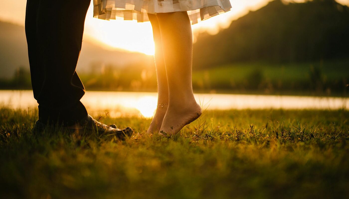 https://www.pexels.com/photo/man-and-woman-standing-on-green-grass-412295/