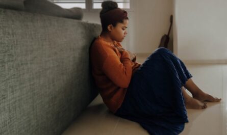 https://unsplash.com/photos/man-in-orange-long-sleeve-shirt-sitting-on-gray-couch-rXrMy7mXUEs