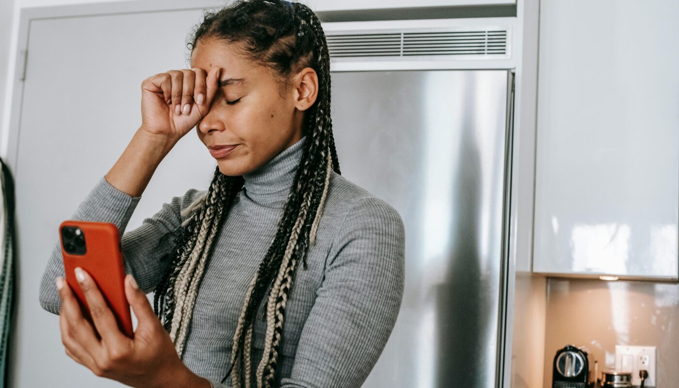 https://www.pexels.com/photo/sad-young-ethnic-lady-arguing-during-video-call-5699825/