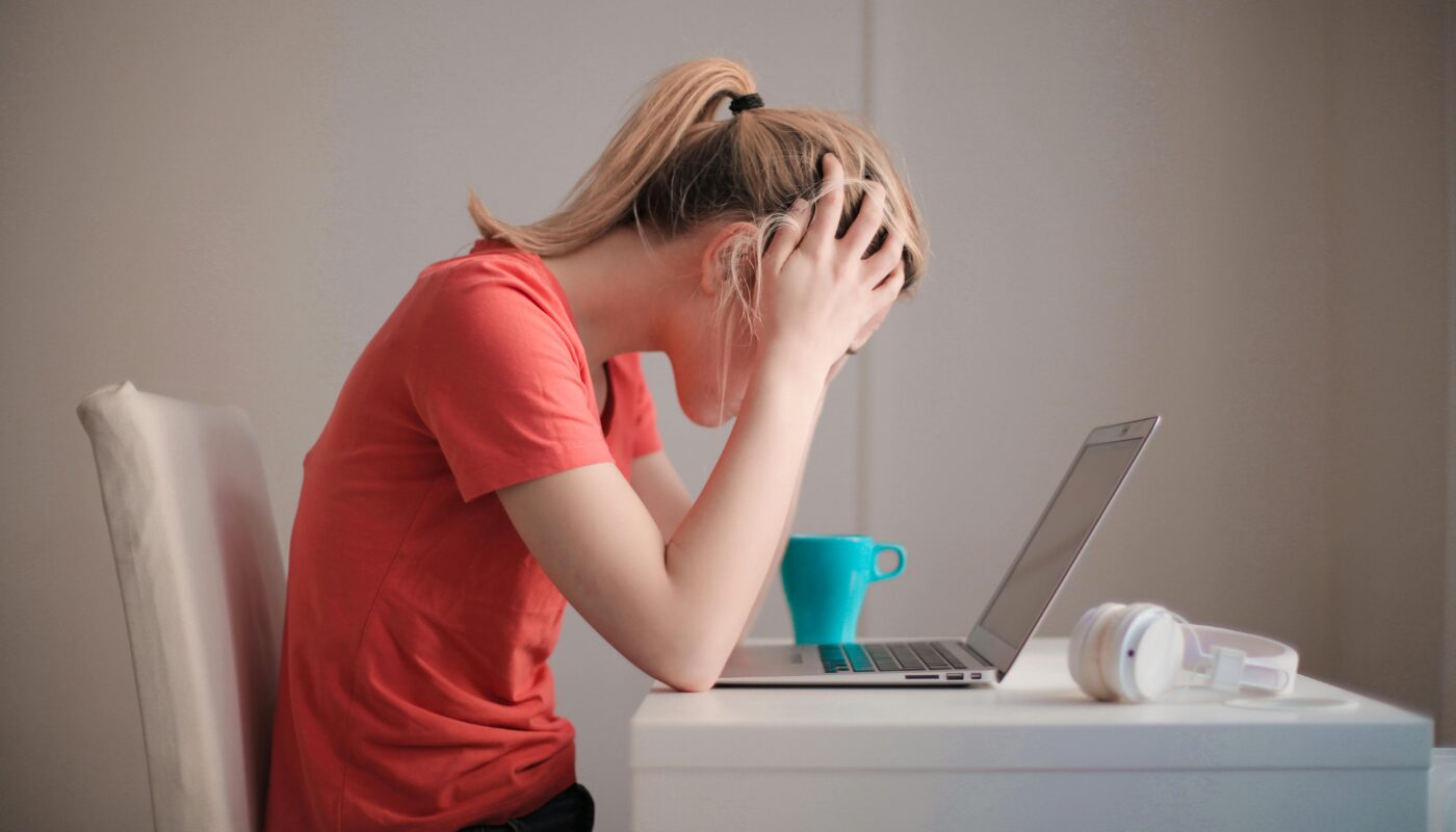 https://www.pexels.com/photo/woman-in-red-t-shirt-looking-at-her-laptop-3755761/