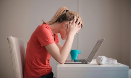 https://www.pexels.com/photo/woman-in-red-t-shirt-looking-at-her-laptop-3755761/