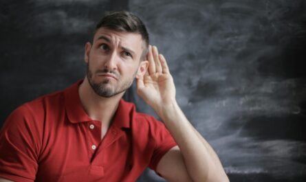 https://www.pexels.com/photo/man-in-red-polo-shirt-sitting-near-chalkboard-3779448/