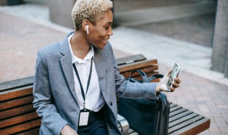 https://www.pexels.com/photo/cheerful-african-american-lady-having-video-conversation-on-smartphone-during-break-6000098/