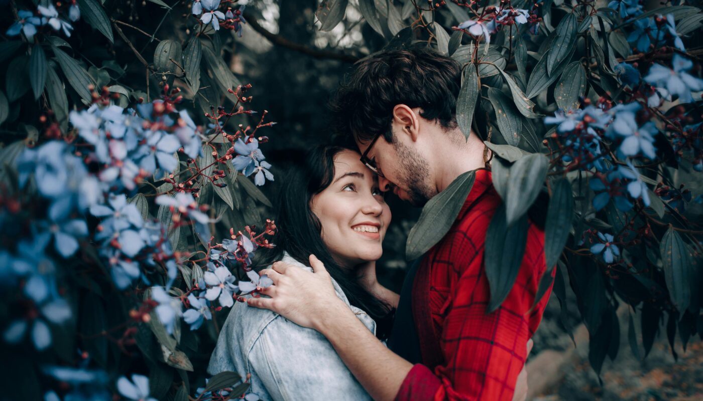 https://www.pexels.com/photo/man-and-woman-standing-under-flowering-tree-2055225/