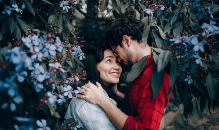 https://www.pexels.com/photo/man-and-woman-standing-under-flowering-tree-2055225/